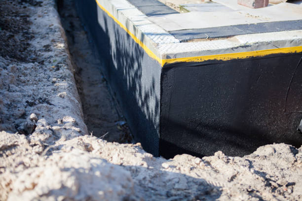 Professional Waterproofing technician working in Hamilton, IN